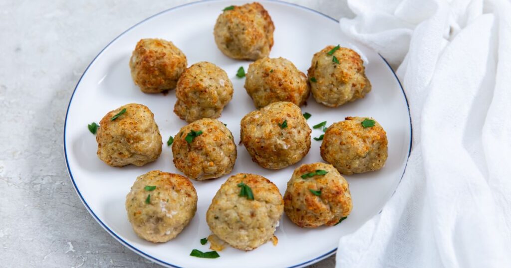 air fryer ground chicken meatballs on a white plate