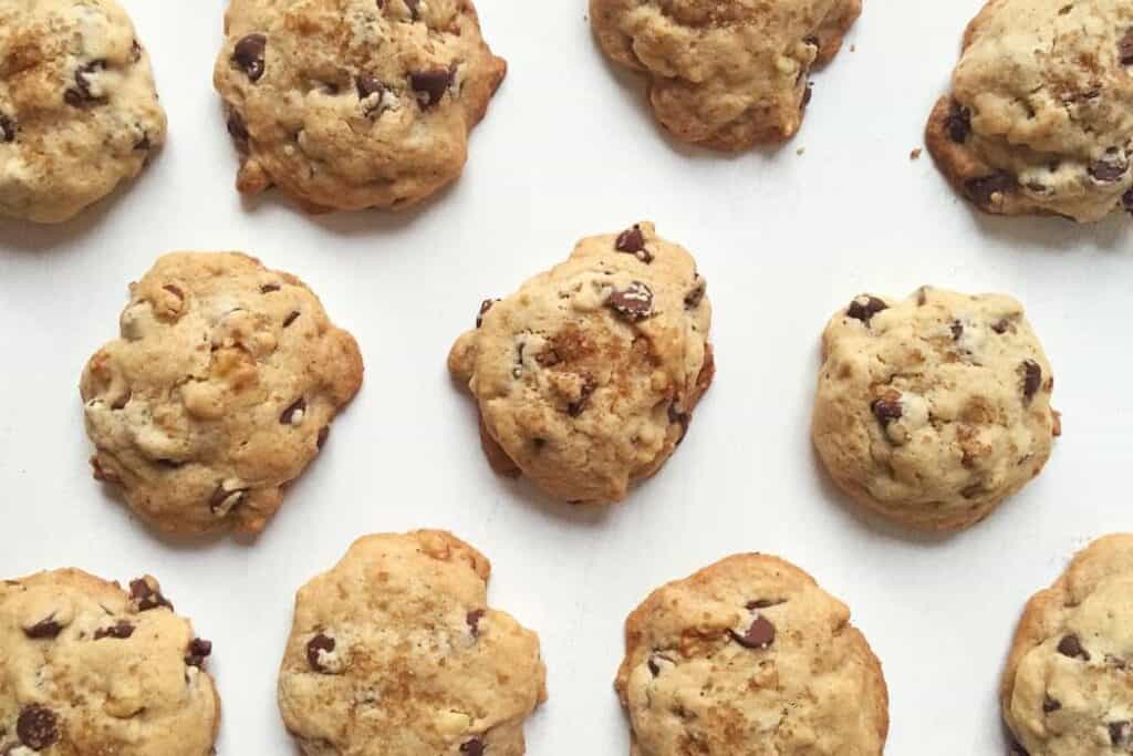 brown butter bourbon chocolate chip cookies on a white countertop.