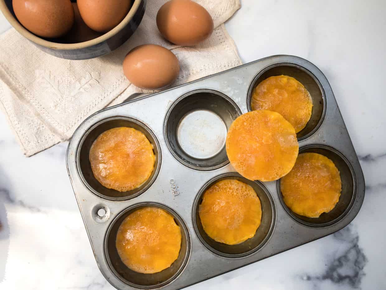 Frozen eggs in a muffin tin.