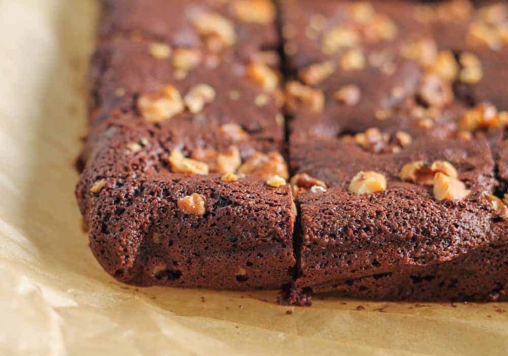 Gluten free brownies on parchment paper.