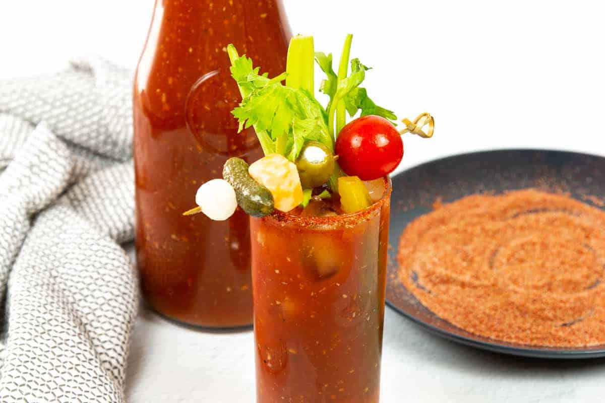 A closeup of a garnish on a Bloody Mary made with homemade Bloody Mary mix.