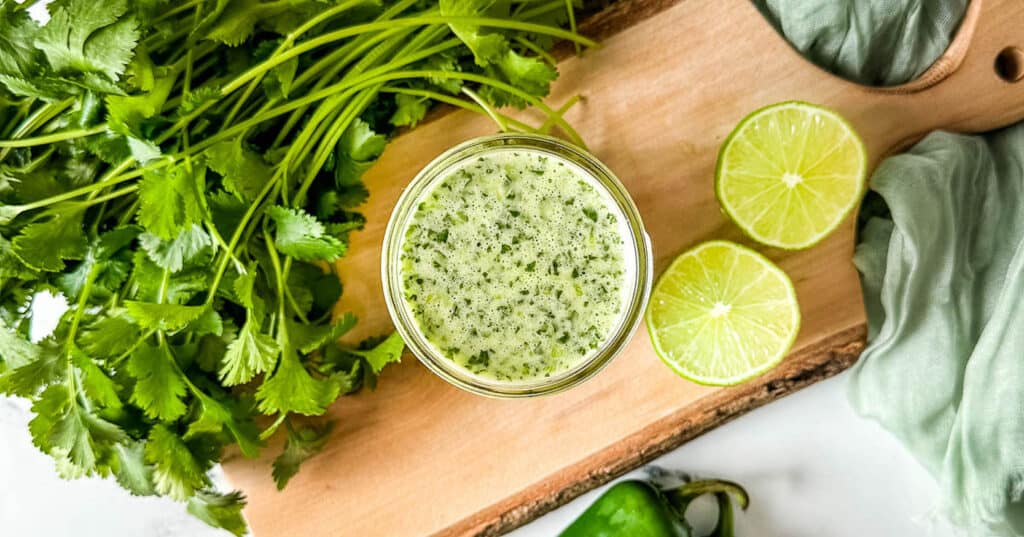 Honey lime jalapeno vinaigrette in a glass jar.