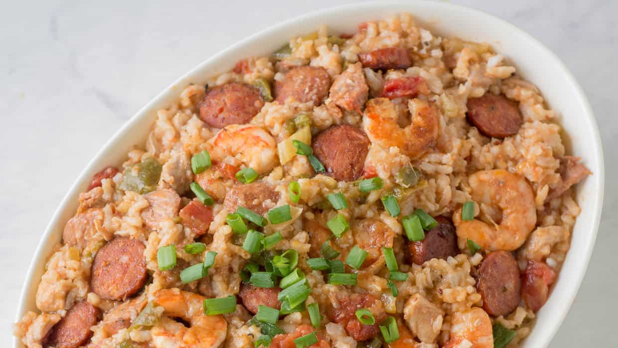 Top view of Instant Pot jambalaya in a white bowl with shrimp and sausage.