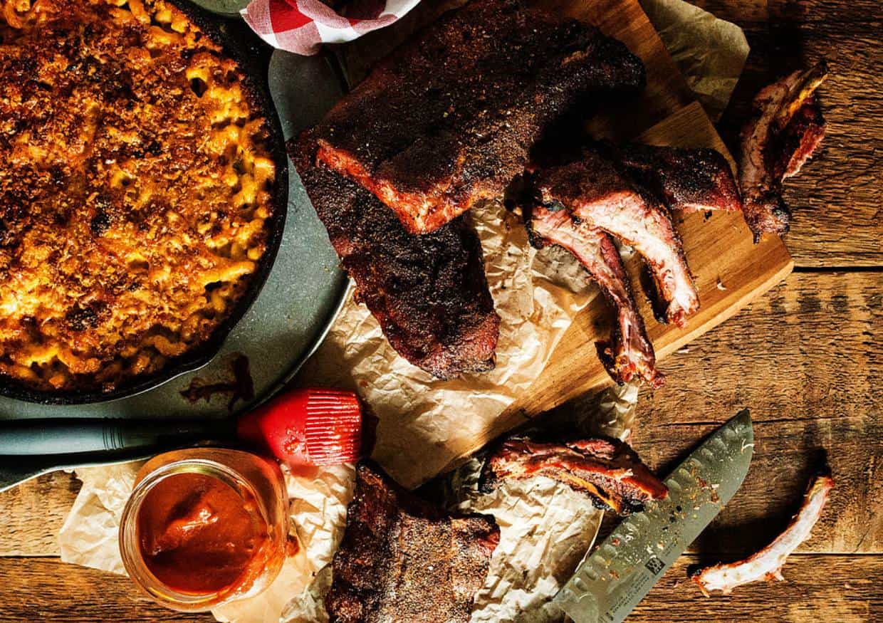 Overhead shot of smoked ribs with mac and cheese.