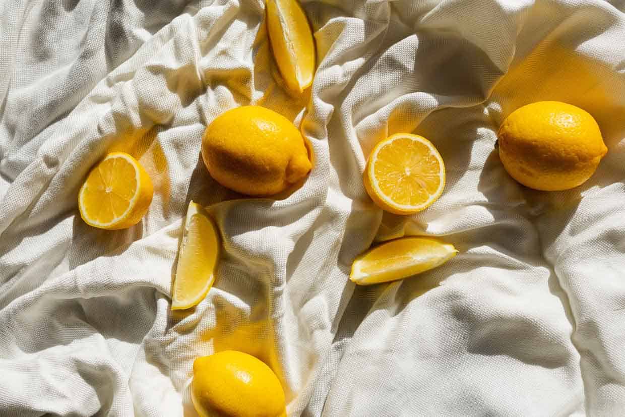 Lemon pieces spread on a sheet.