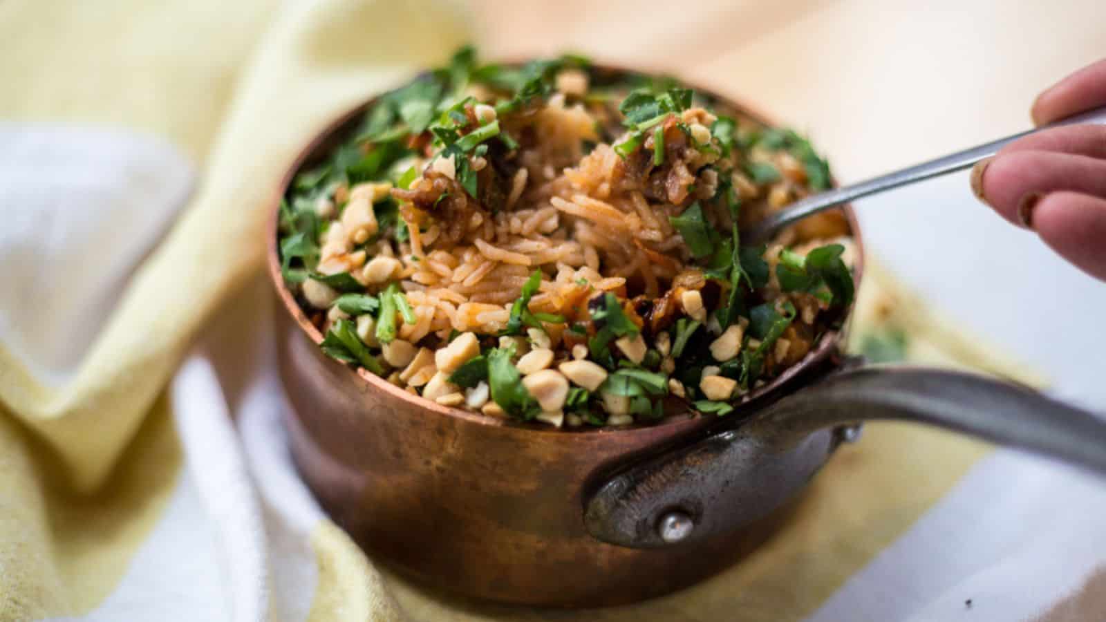 Rice pilaf in copper saucepan.