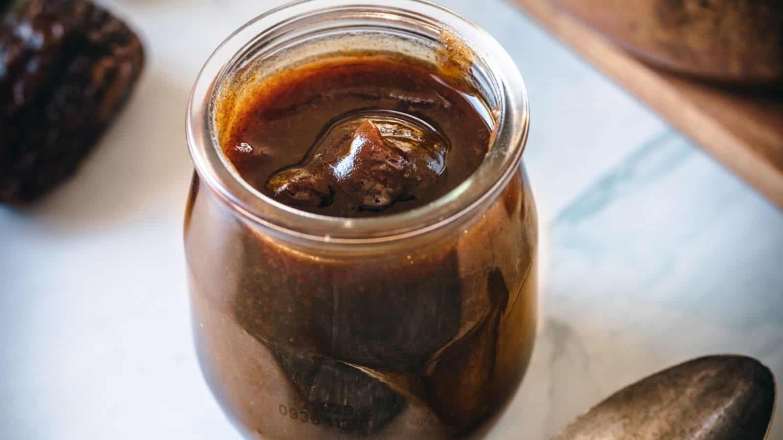 Jar of date syrup.