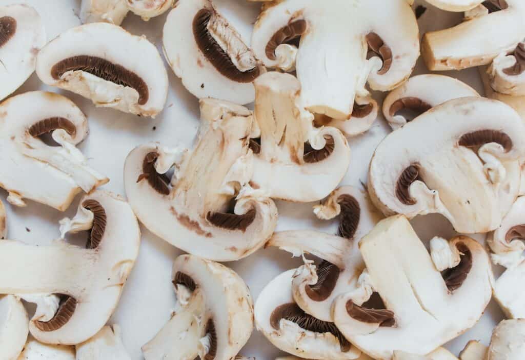 Sliced white mushrooms.