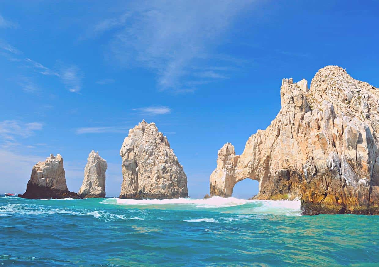 Close up of teal waters and the iconic rocks of Cabo.