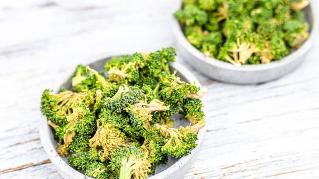 Broccoli chips on a plate.