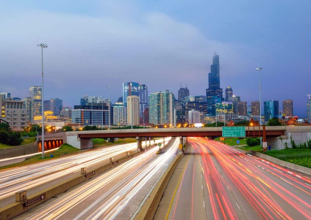 Traffic flowing to and from downtown Chicago at dusk.