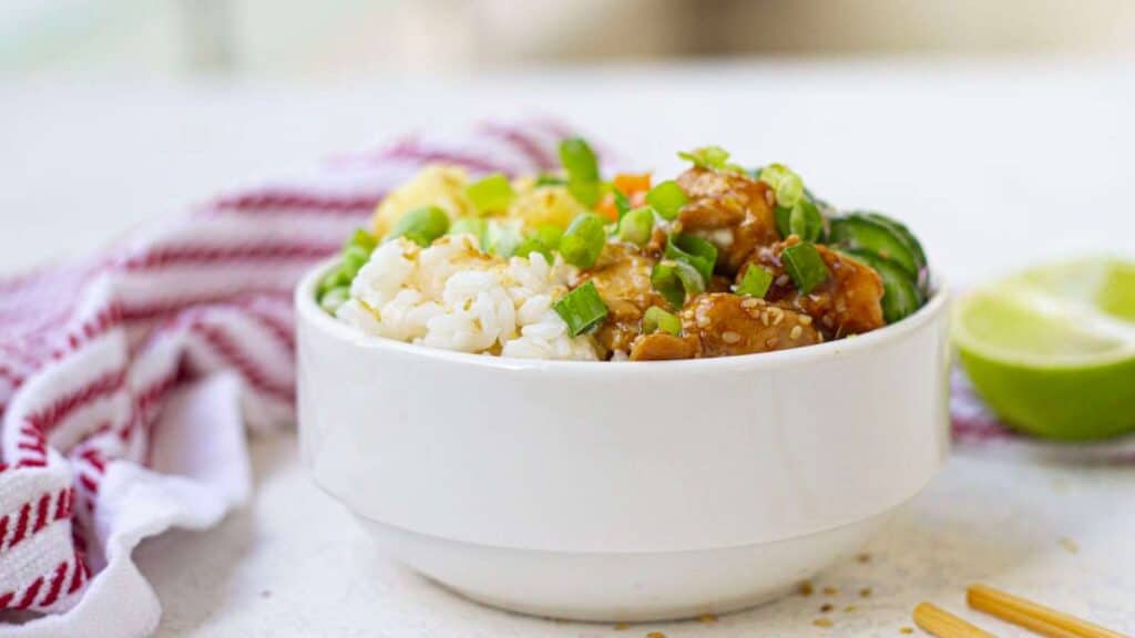 Bowl of chicken teriyaki and pineapple.