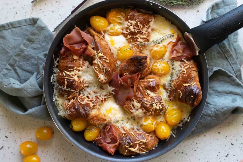 Overhead view of a croissant breakfast casserole.