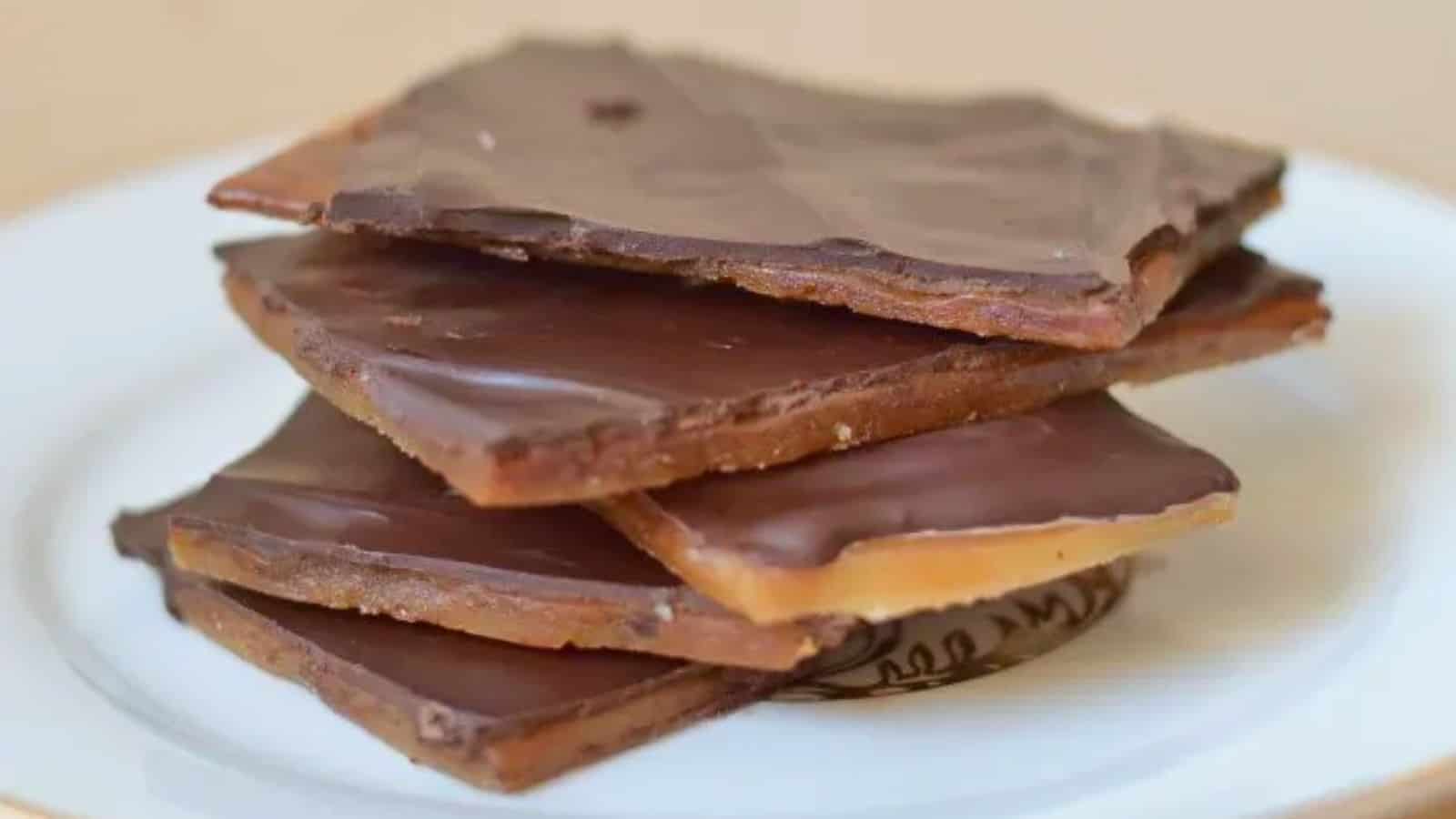 Image shows a stack of English Toffee on a white plate.