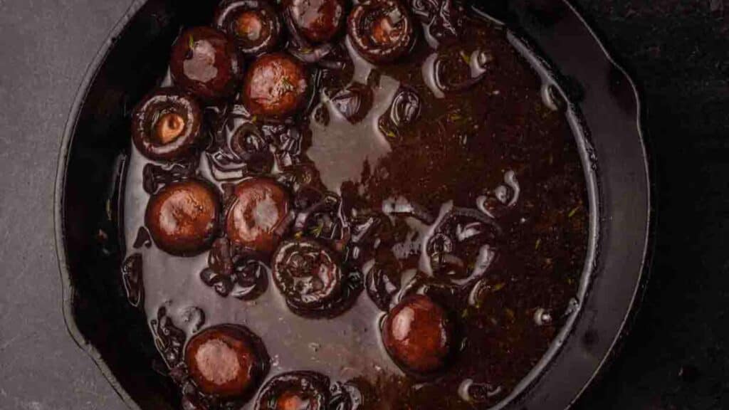 Skillet of red wine sauce.