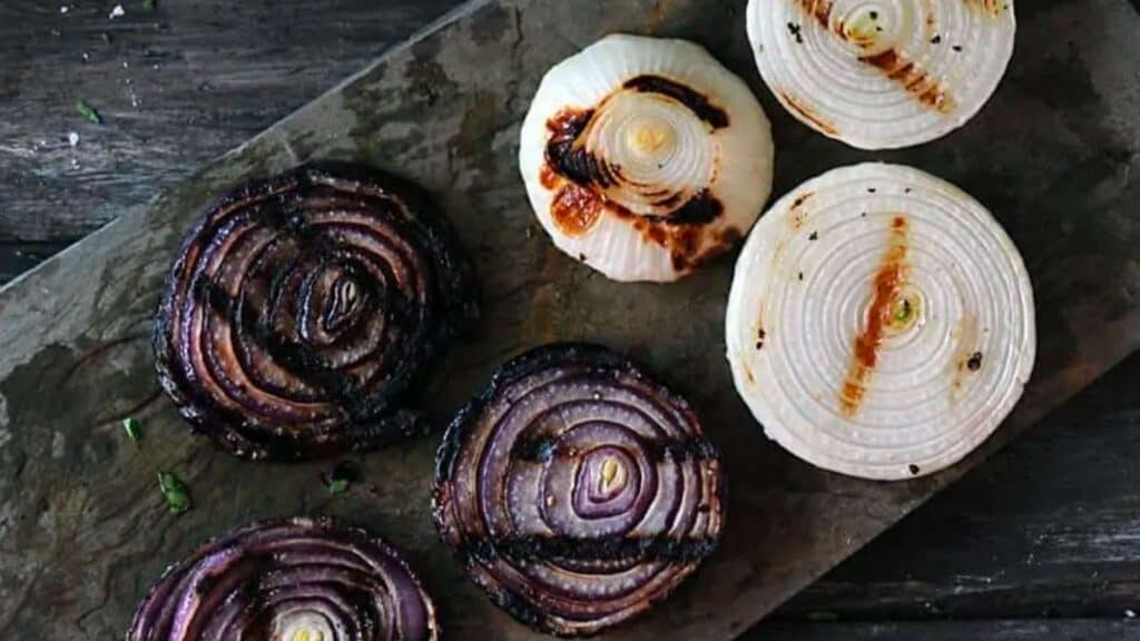 Platter of grilled red and white onions slices.