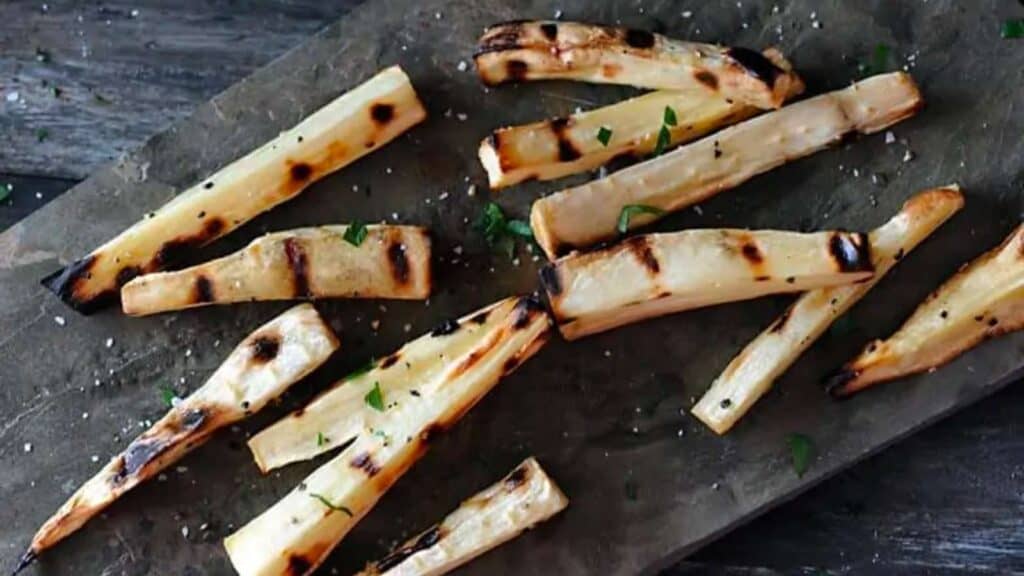 Platter of grilled parsnip spears.