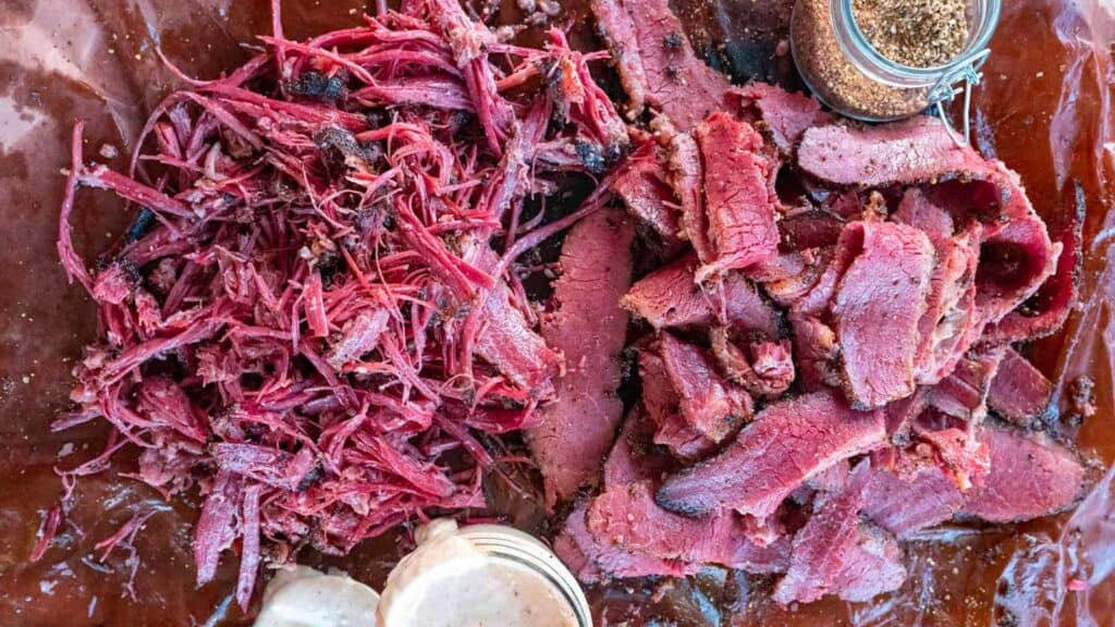 Sliced and shredded brisket pastrami.