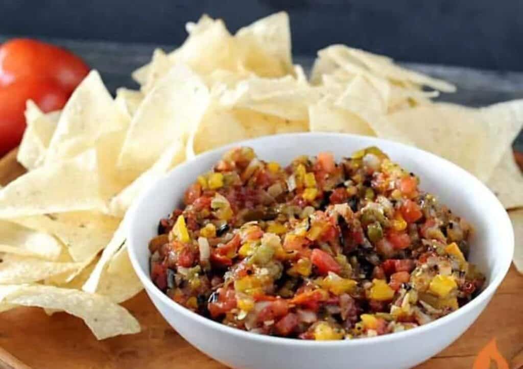 Bowl of colorful grilled salsa.