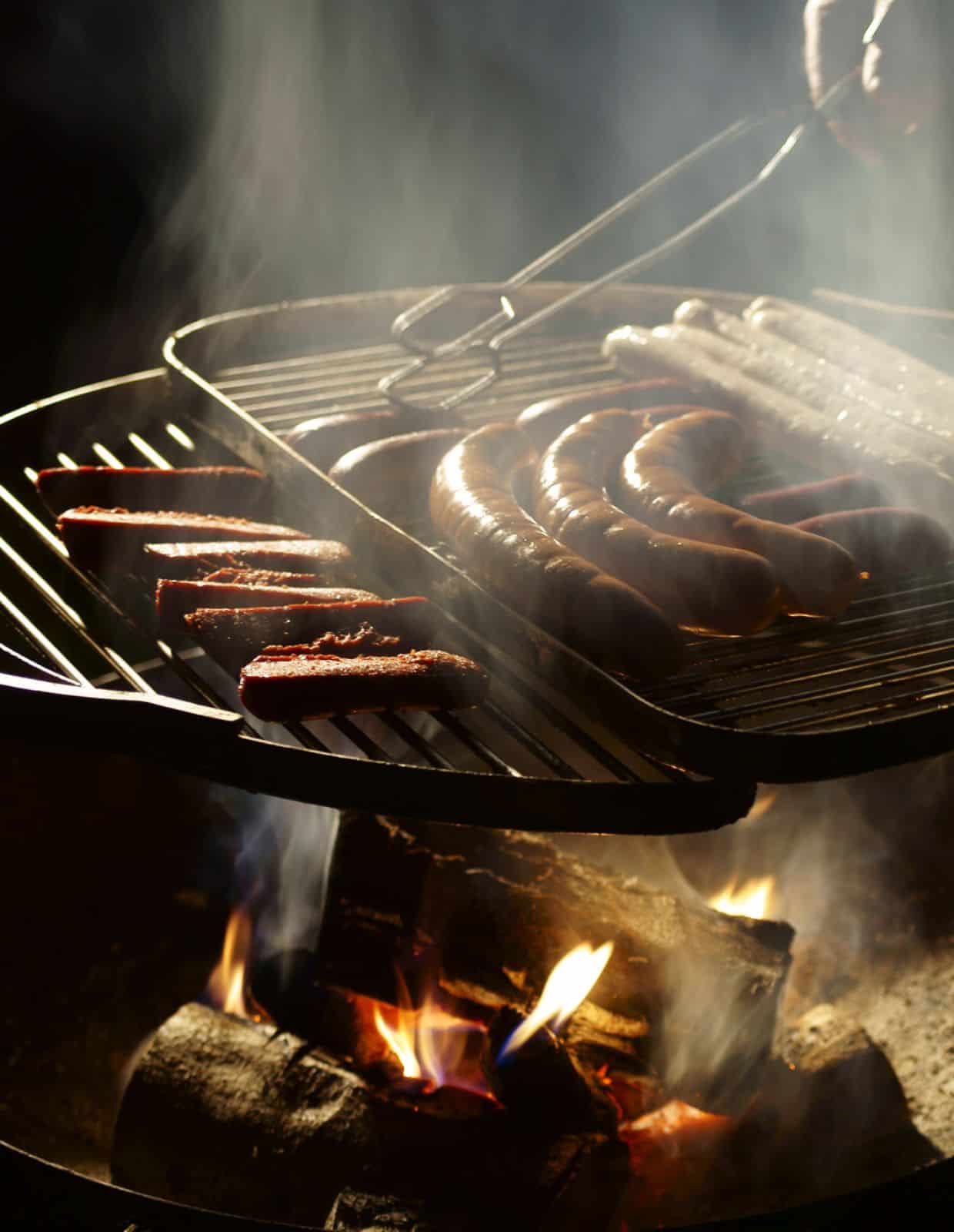 Grilling over wood fire. 