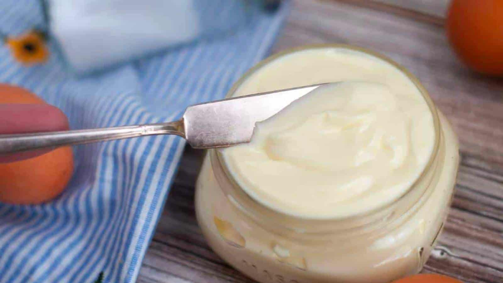Homemade mayonnaise in mason jar.