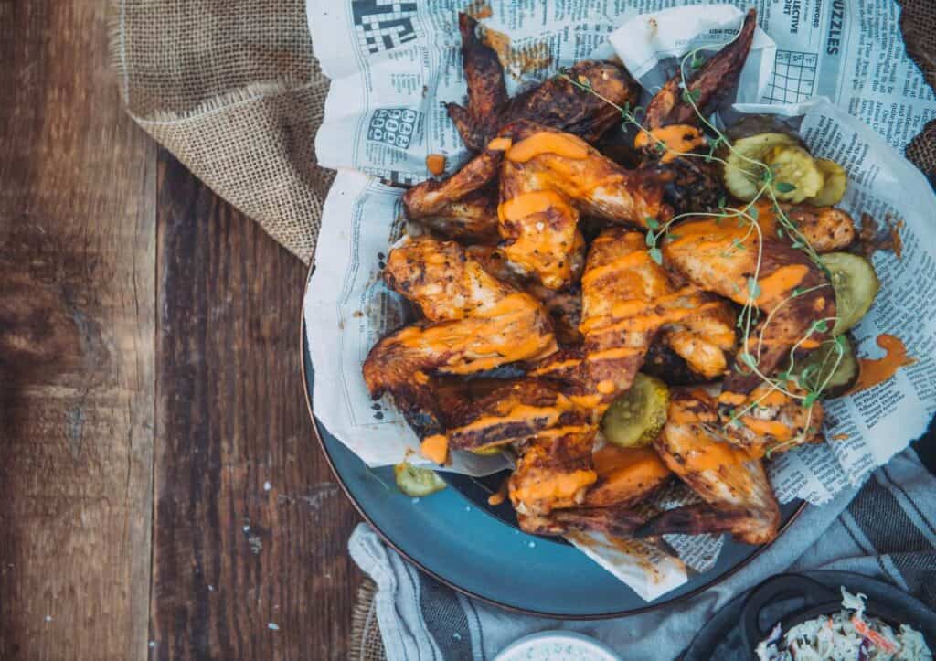 Platter of messy chicken wings.