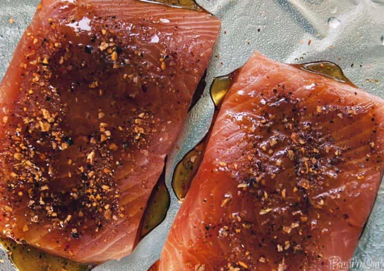 Overhead of salmon on foil. 