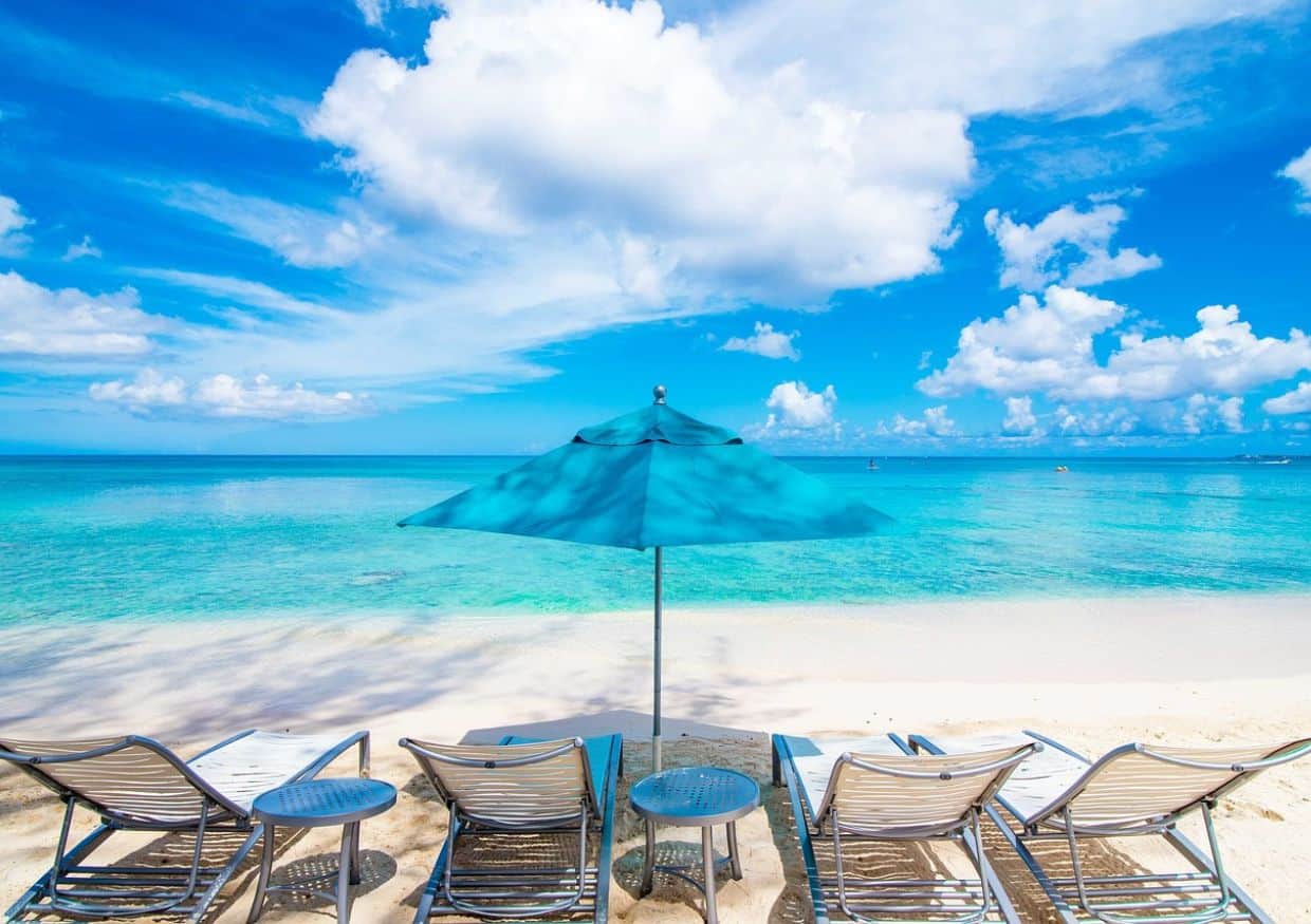 Beach chairs on Caribbean beach.
