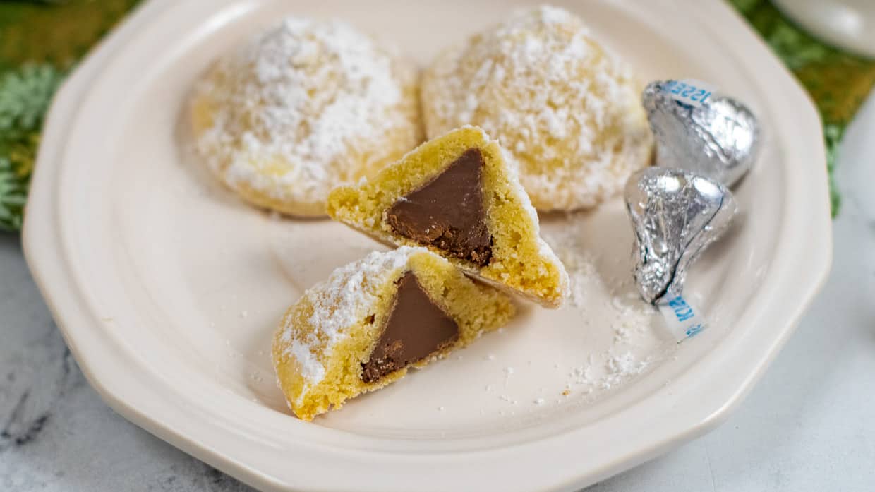 Hershey's kiss baked inside a cookie and dusted with powdered sugar.