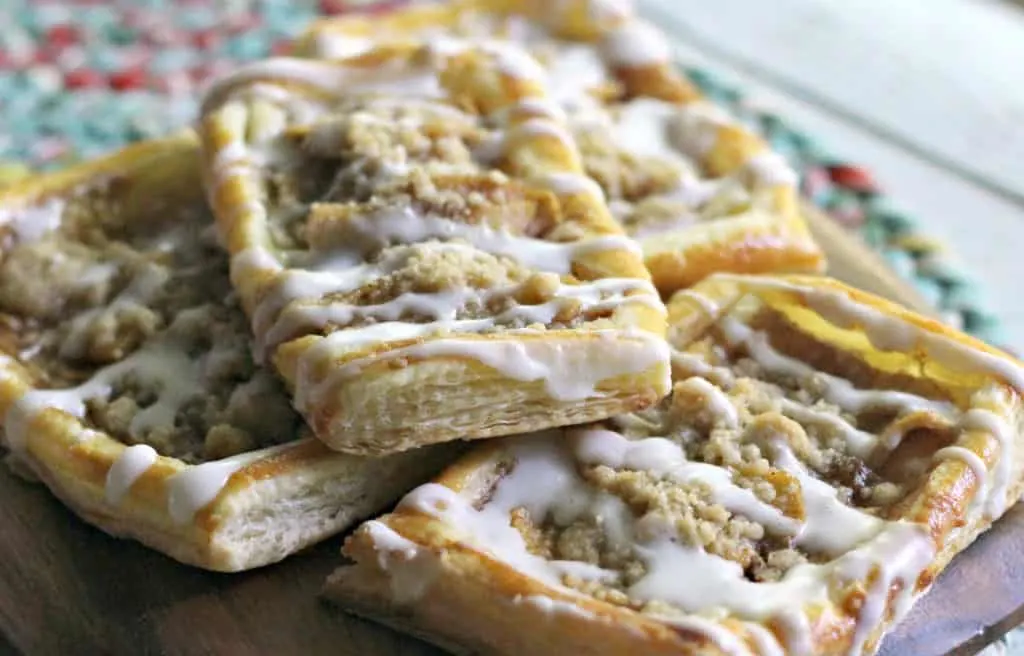 Stacked apple danishes.