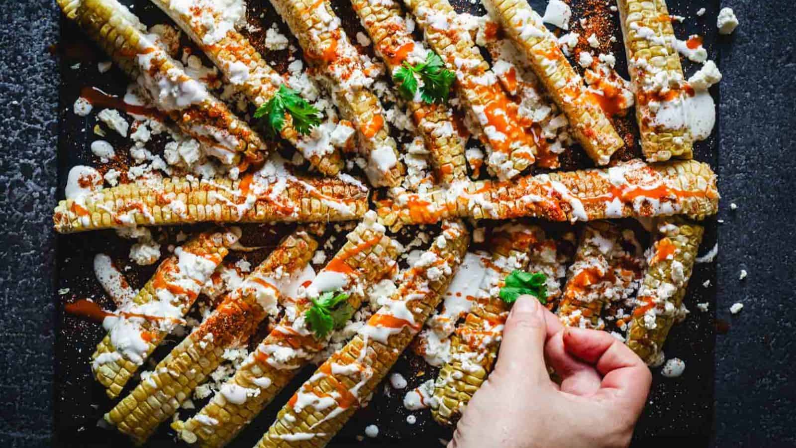 A tray of Halloween skeleton elote board.
