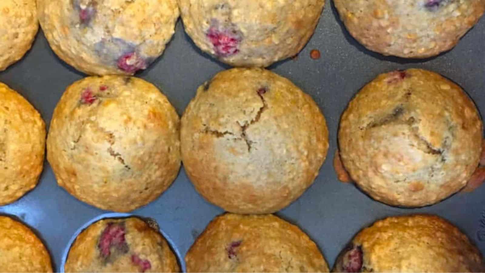 Raspberry lemon almond muffins in a pan.