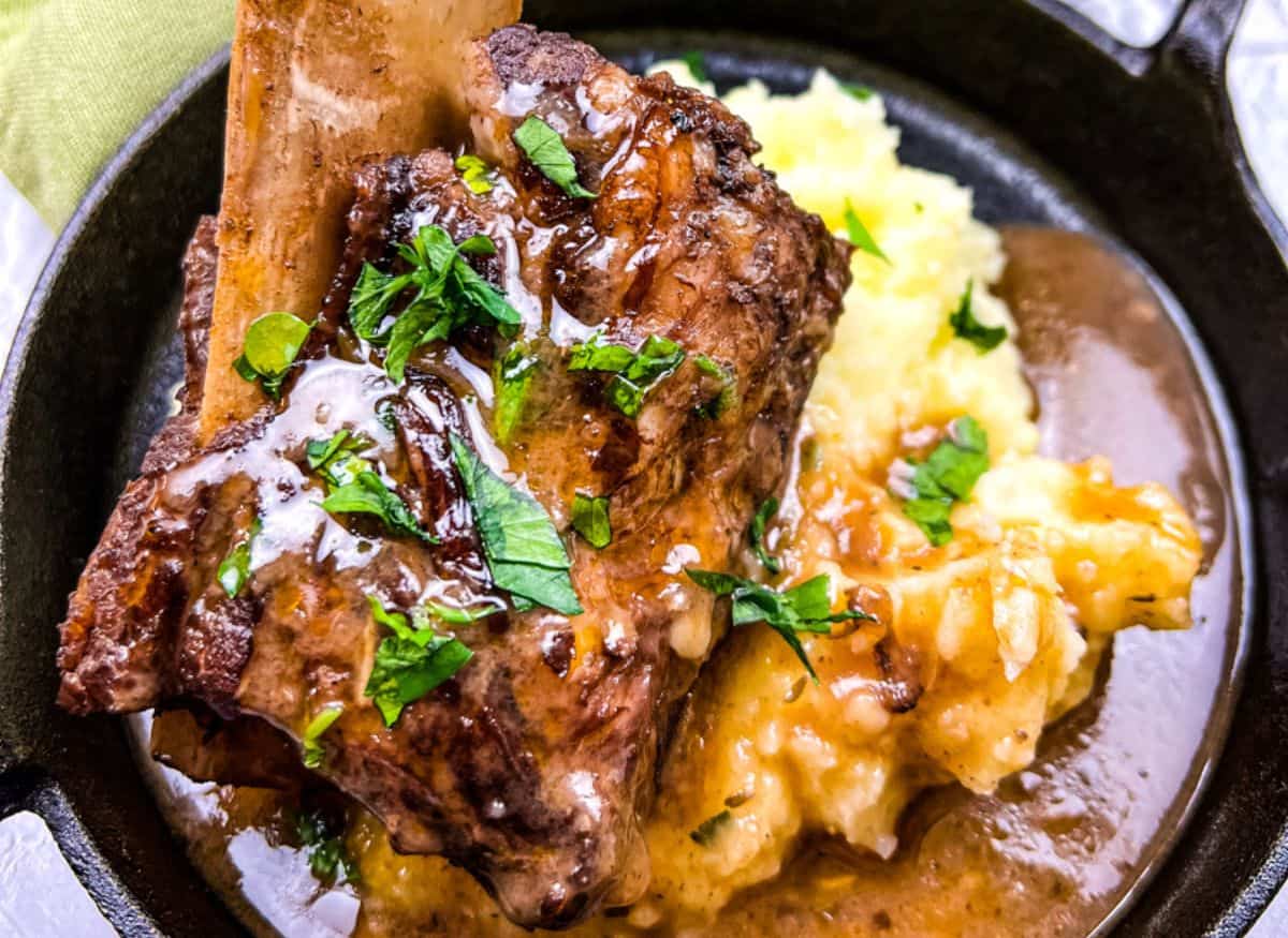 Braised Beef Short Ribs with gravy and mashed potatoes.