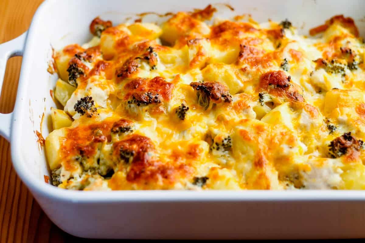 Image of a casserole with a bubbling cheesy top.