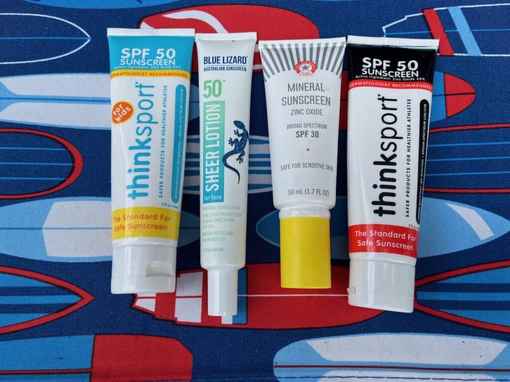 Collection of reef-safe sunscreen brands.