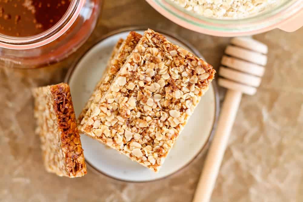 Overhead image of oatmeal bars on a plate.