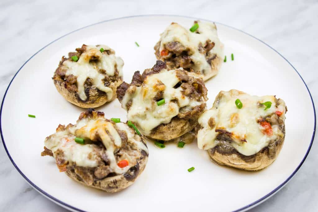 Philly Cheesesteak Stuffed Mushrooms on a plate.