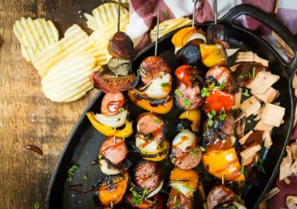 Grilled sausage skewers with peppers and potatoes.