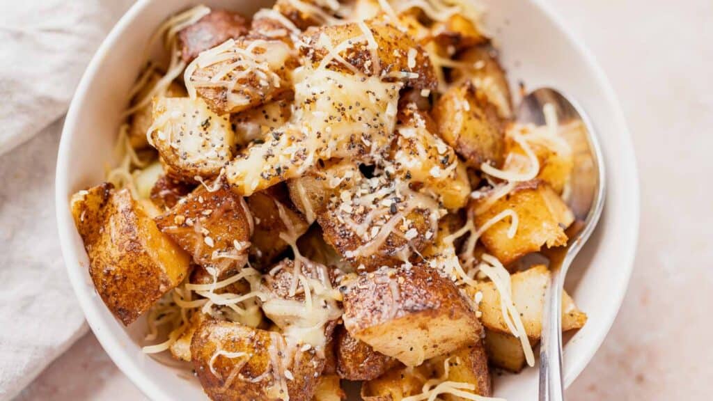Budget-friendly roasted potatoes with cheese and parmesan.