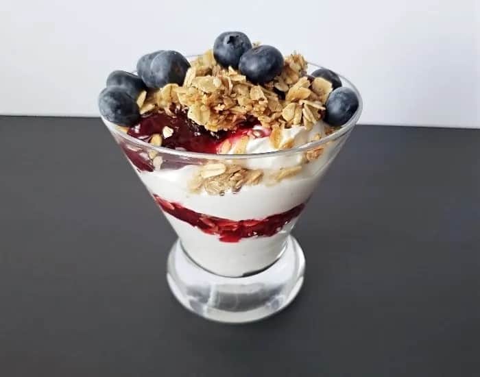 Yogurt parfait with berries and granola.