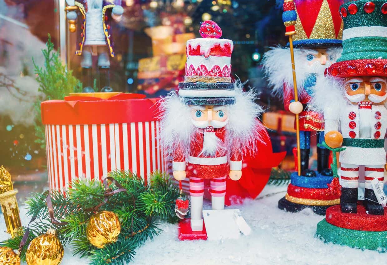 Image shows  Christmas nutcrackers in a window display.