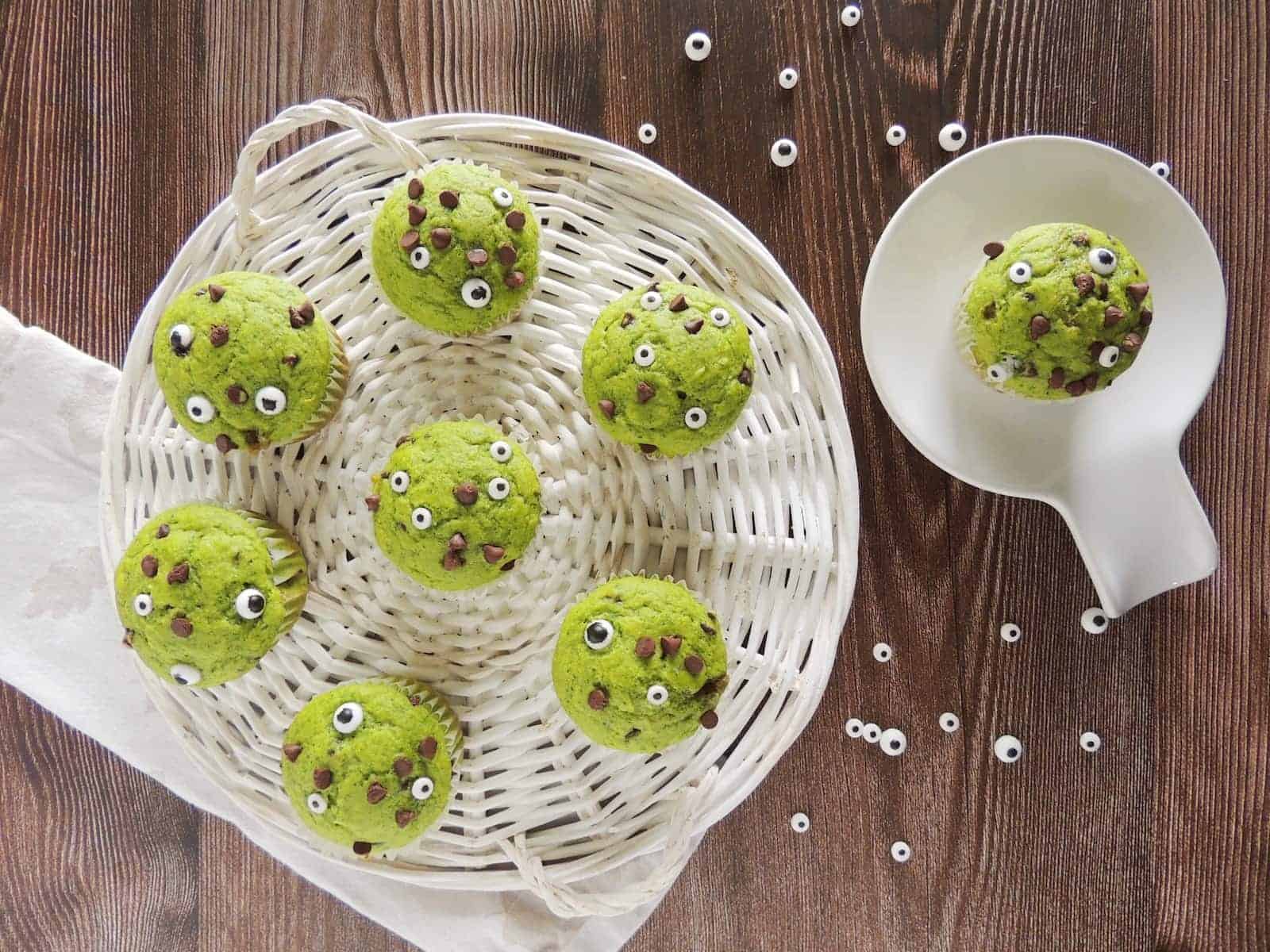 Green monster muffins in a wicker basket.