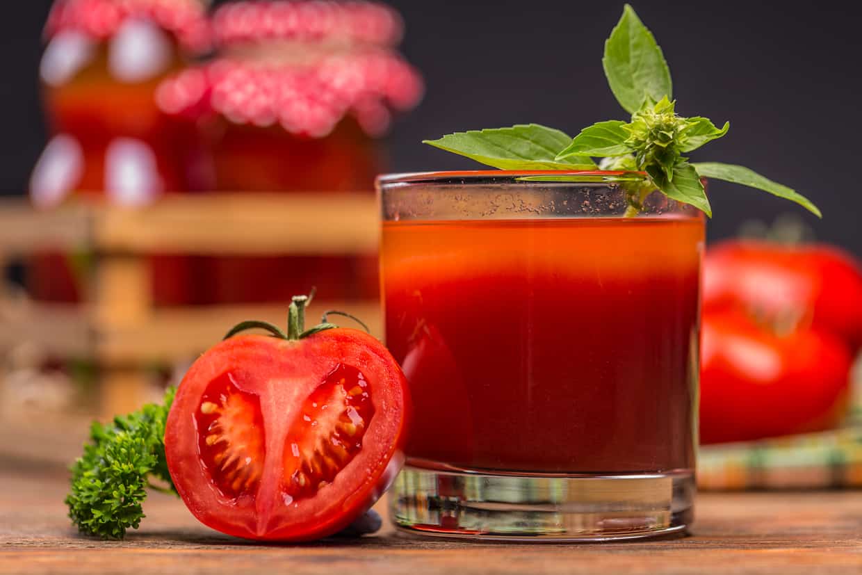 A savory cocktail incorporating tomato juice, tomatoes, and basil.