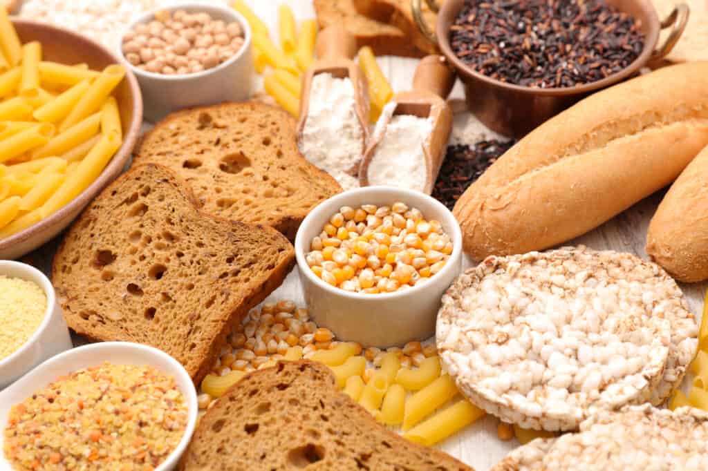 A variety of foods including bread, pasta and rice.
