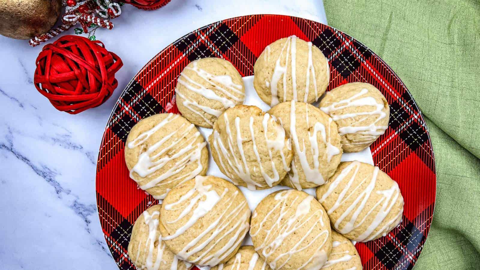 A plate of eggnog cookies with with spiced rum glaze on top.