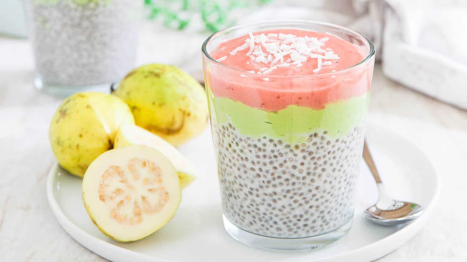 Two glasses of chia pudding on a plate.