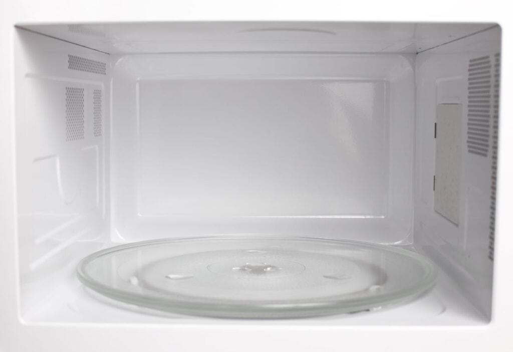 The inside of a clean microwave.