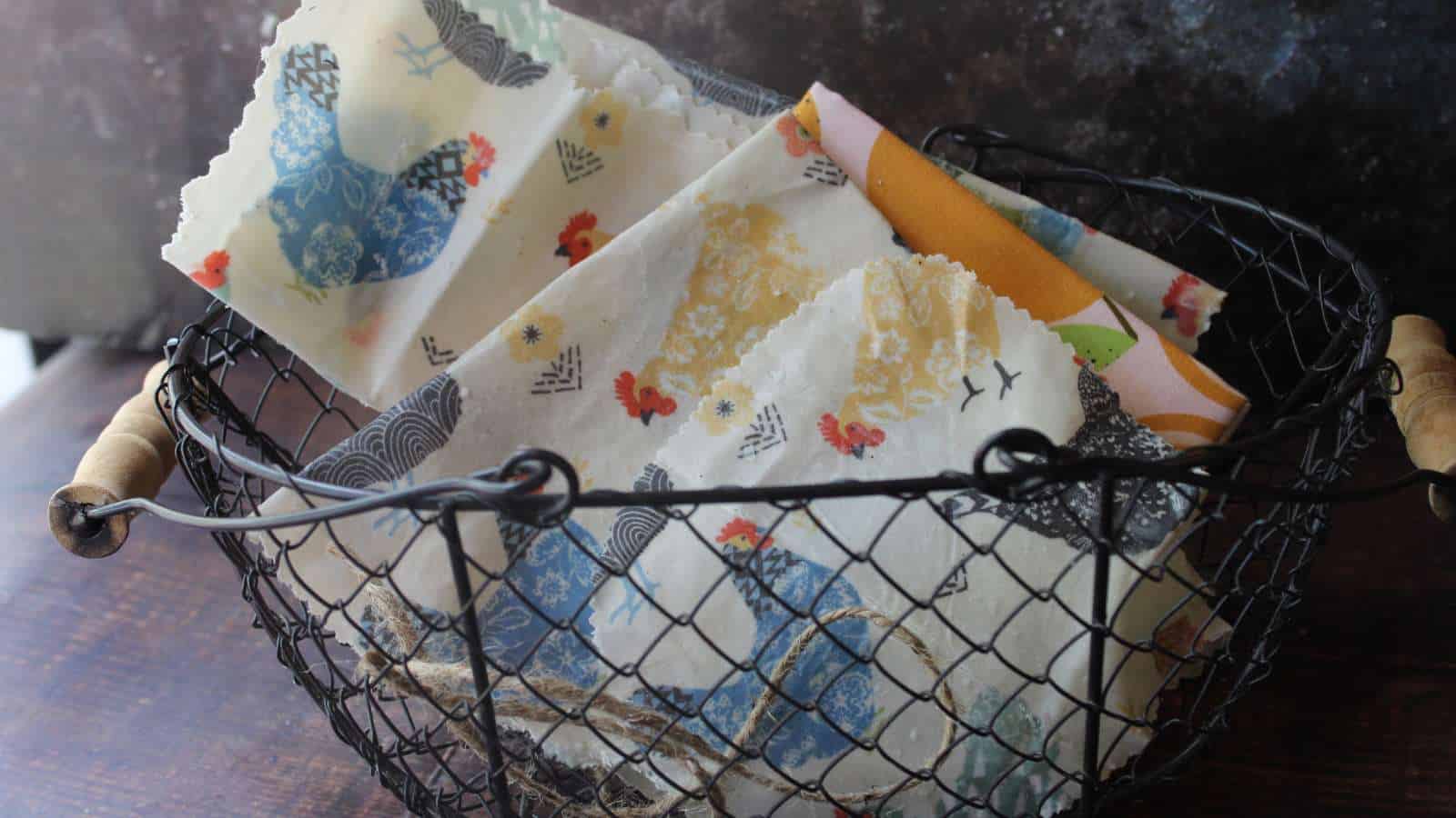 A wire basket filled with beeswax wraps.