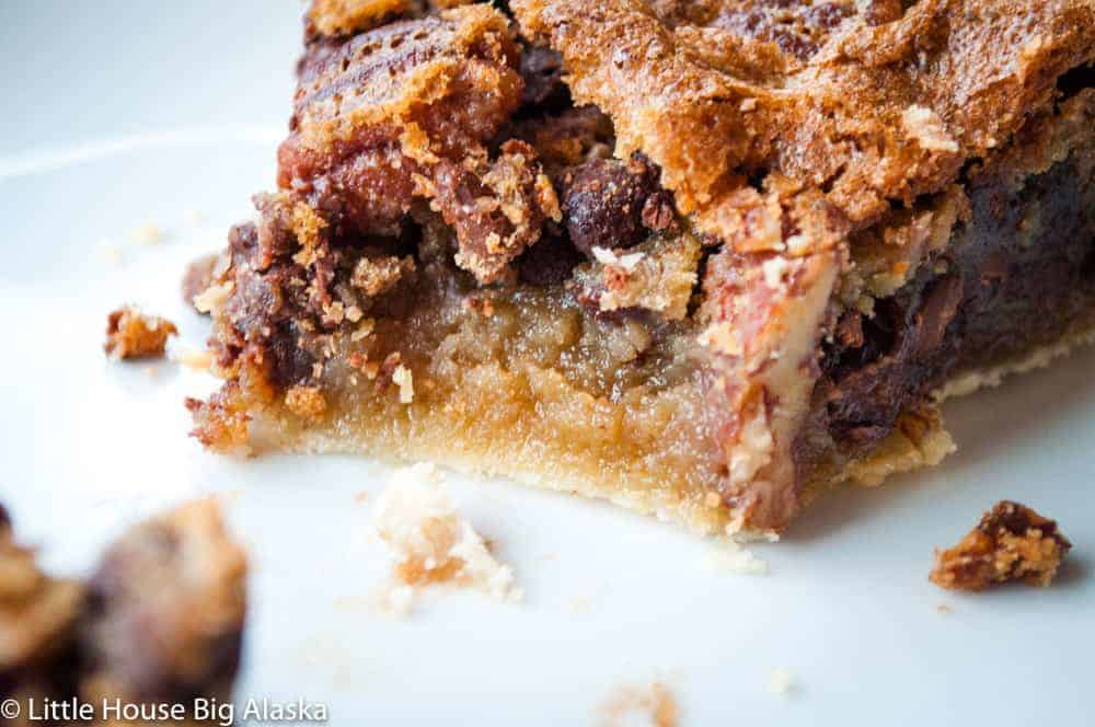 A slice of chocolate pecan pie.