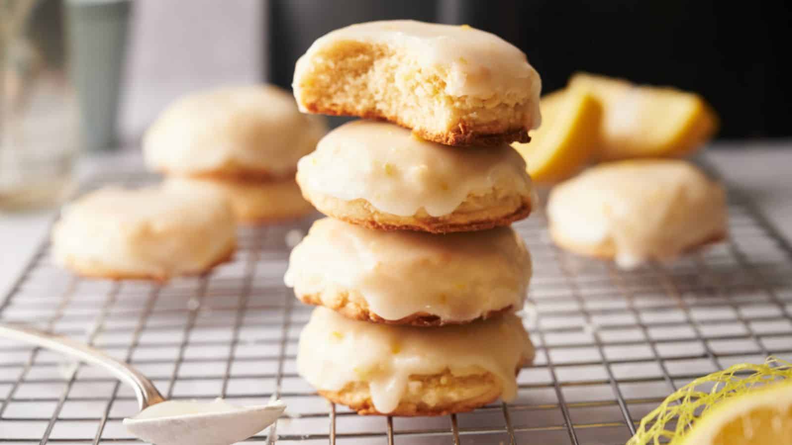 A stack of lemon cookies on a cooling rack.